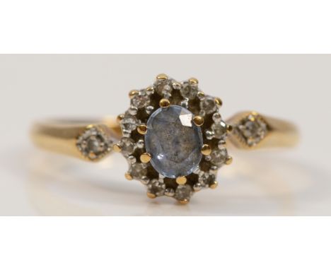 A 9ct gold sapphire and diamond cluster ring, K, 1.9g