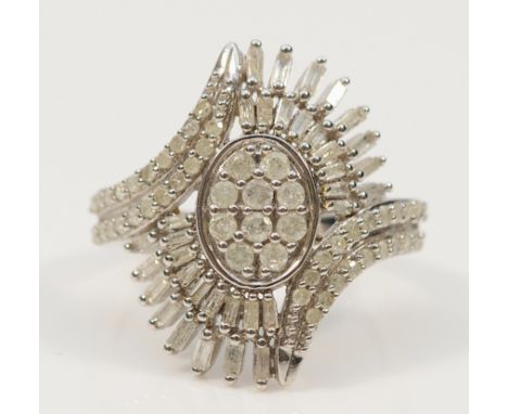 A 9ct white gold vari cut diamond dress ring, 23mm ring front, O, 4.7g