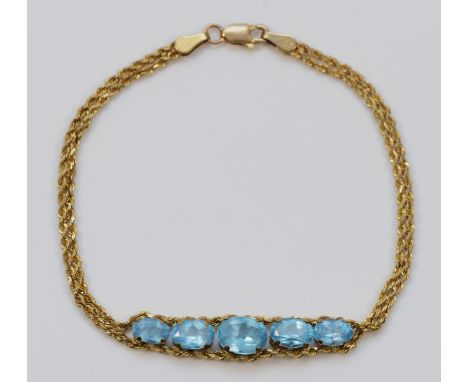 A 9ct gold blue gemstone bracelet, 18cm, 4.3g