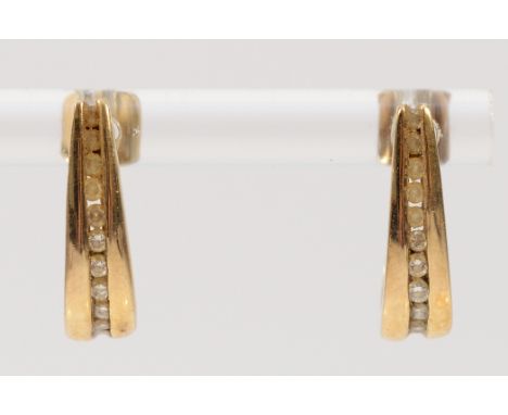 A pair of 9ct gold diamond half hoop earrings with scroll backs, 2.4g