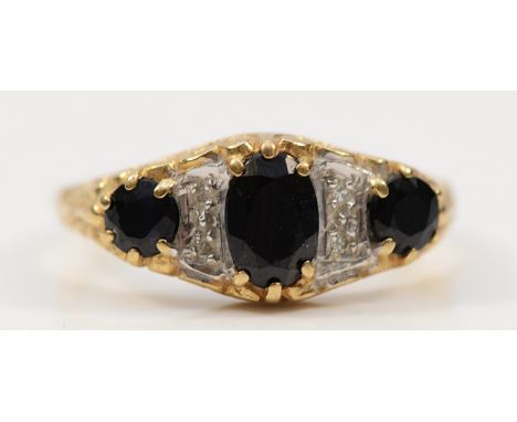 A 9ct gold sapphire and diamond dress ring, J, 1.9g