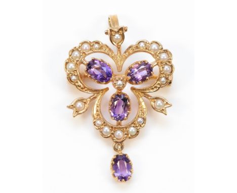 A 9ct gold amethyst and seed pearl brooch with a pendant loop, 35mm, London 1988, 4.9g
