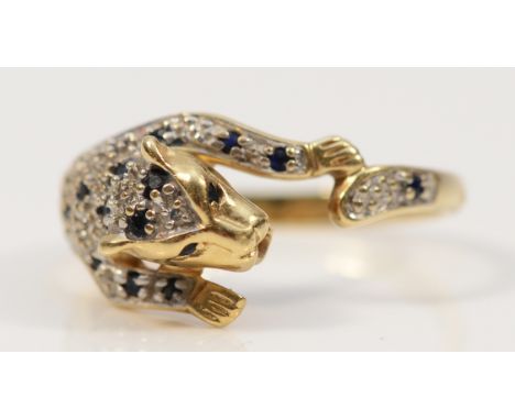 A 9ct gold sapphire and diamond leopard ring, P, 2.8g