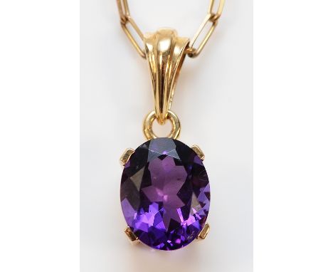 A 9ct gold amethyst pendant on a chain, 10mm x 7mm amethyst, 3.3g
