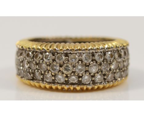 An 18ct white and yellow gold brilliant cut diamond three row dress ring, K, estimated at approx 2ct, colour estimate G/H, cl
