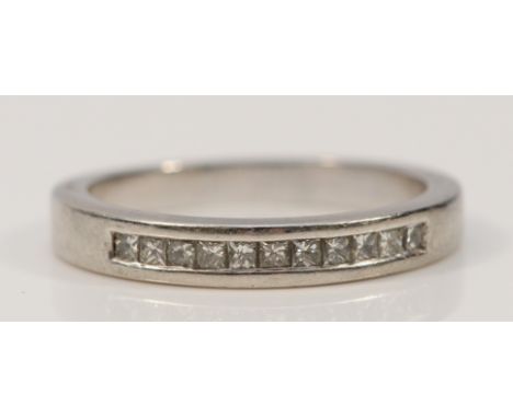 A 950 platinum Princess cut diamond half eternity ring, L 1/2, 4.7g