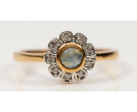 A 9ct gold cats eye chrysoberyl and white gemstone cluster ring, N 1/2, 1.8g