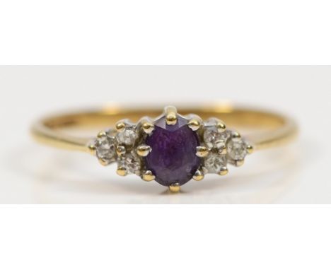 A 9ct gold amethyst and diamond dress ring, O, 1.5g