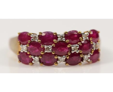 A QVC 9ct gold ruby and diamond three row dress ring, S, 3.2g