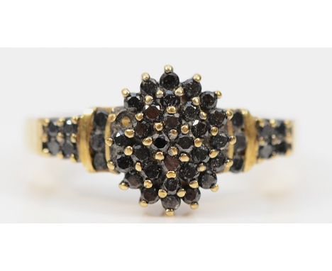 A 9ct gold black diamond cluster ring, stated 0.50ct, K, 2.5g