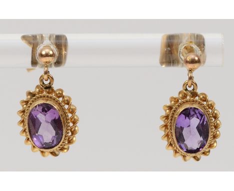 A pair of 9ct gold amethyst drop earrings with scroll backs, 1.6g