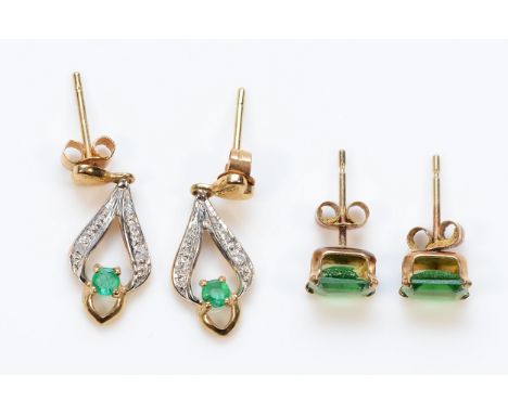 A pair of 9ct gold emerald earrings with scroll backs, together with a pair of 9ct gold emerald and diamond earrings with scr