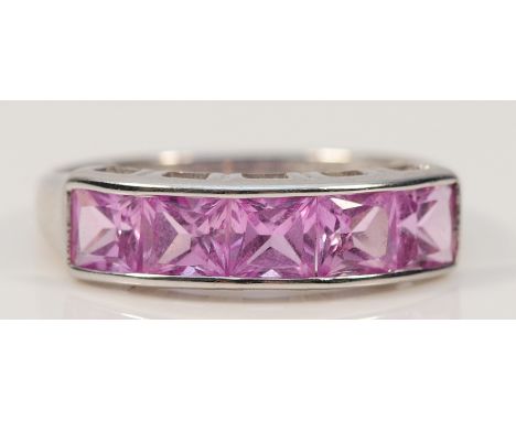 A 9ct white gold pink gemstone five stone ring, O, possibly pink topaz, 2.1g