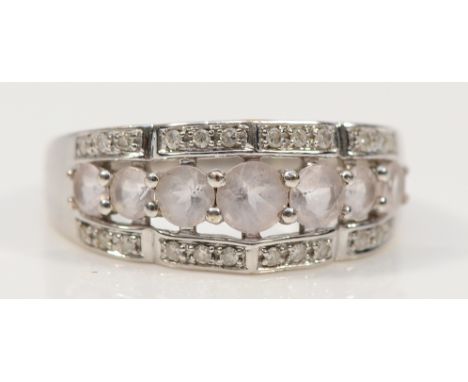 A 9ct white gold morganite and brilliant cut diamond dress ring, O, 3.7g