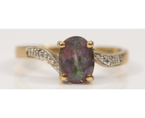 A 9ct gold mystic topaz and diamond dress ring, O, 2.1g