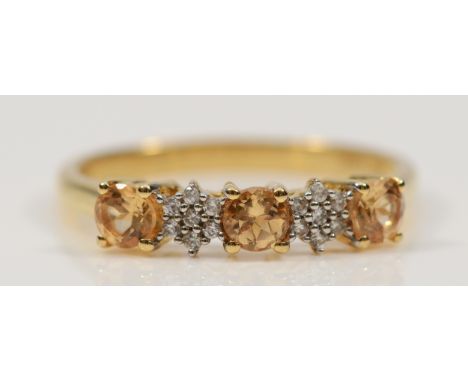 A 9ct gold diamond and citrine dress ring, N, 1.9g