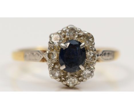 An 18ct gold sapphire and diamond cluster ring, N, 2.7g