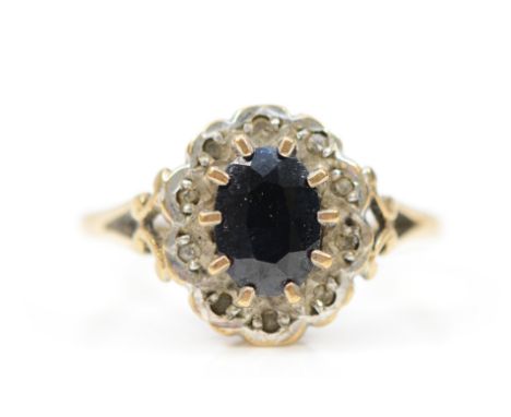 A 9ct gold sapphire and diamond cluster ring, M, 2g