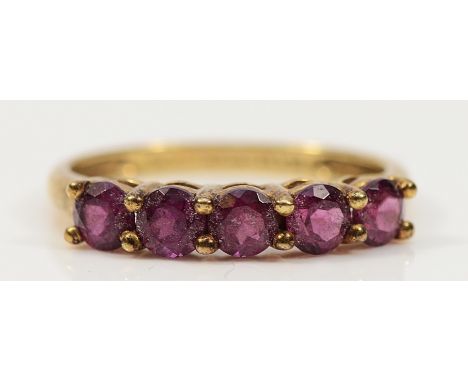 A QVC 9ct gold garnet five stone dress ring, K, 1.4g
