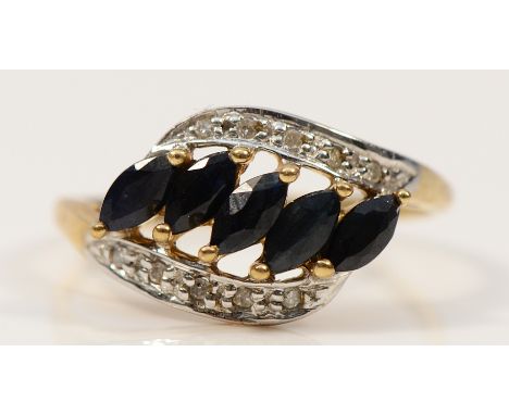 A 9ct gold sapphire and diamond cross over ring, P, 2.1g