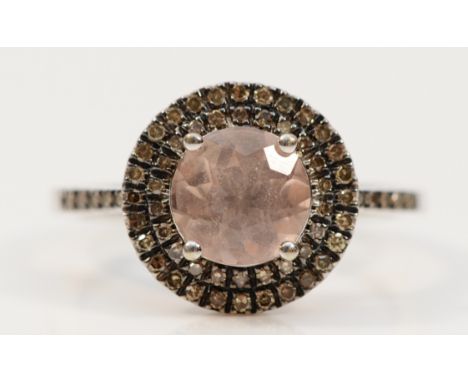 A 9ct white gold morganite and diamond cluster ring, with diamond set shoulders, R 1/2, 3.9g