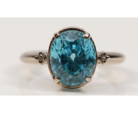 An 18ct white gold blue gemstone solitaire ring, K 1/2, possibly blue topaz, 3.9g