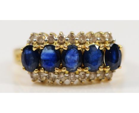 A 14K gold moissanite and blue gemstone cluster ring, N, 3g
