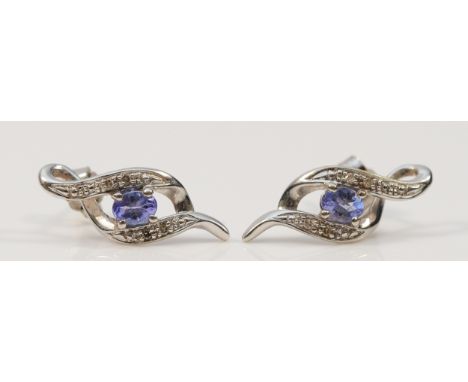 A pair of 9ct white gold tanzanite and diamond drop earrings with scroll backs, 1.4g