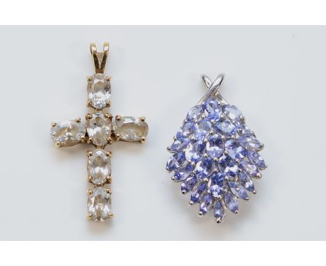 A 9ct white gold tanzanite cluster pendant, 25mm, with a 9ct gold white gemstone cross pendant, 30mm, 4g