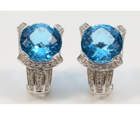 A pair of 14K white gold diamond and blue topaz earrings, 11mm, 7.6g