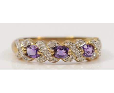 A 9ct gold amethyst and brilliant cut diamond dress ring, Q, 2.4g