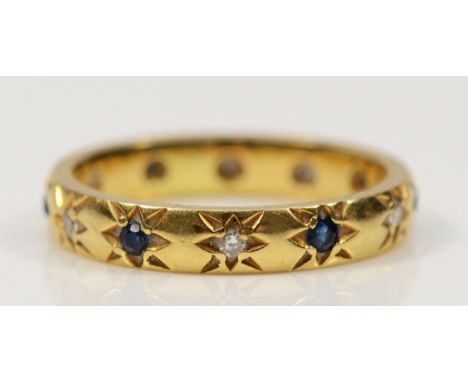 A 14K gold diamond and sapphire star set ring, K 1/2, 3.5g
