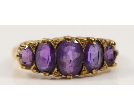 A 9ct gold amethyst five stone ring, Birmingham 1994, N 1/2, 3.2g