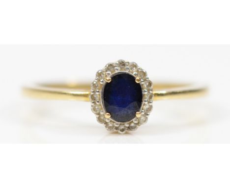 A 9ct gold sapphire and diamond cluster ring, N 1/2, 1.6g