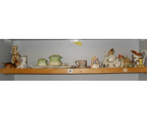 Shelf of small china ornaments