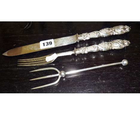 Victorian silver cutlery, a Walker & Hall bread fork Sheffield 1899, and an ornate handled silver cake knife and fork by John