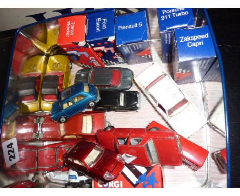 Tin containing vintage diecast vehicles, some still boxed, including Corgi Mini, Mini Marcos and Dinky Pan Hard 24