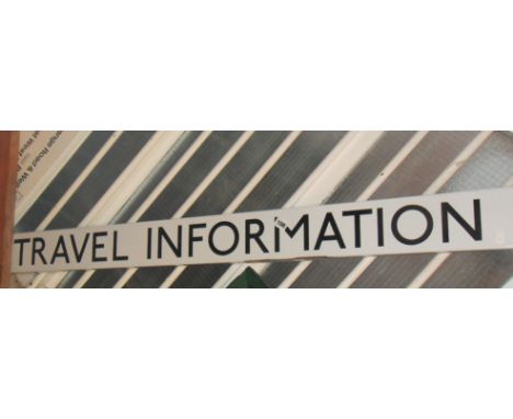 Two British Rail black and white enamel platform signs - "Travel Information" 59" long and "Way Out - Chiswick & Hammersmith 