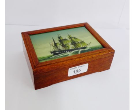 A trinket box, the lid with reverse glass painting depicting a clipper ship with the US flag, 16 x 12cm 
