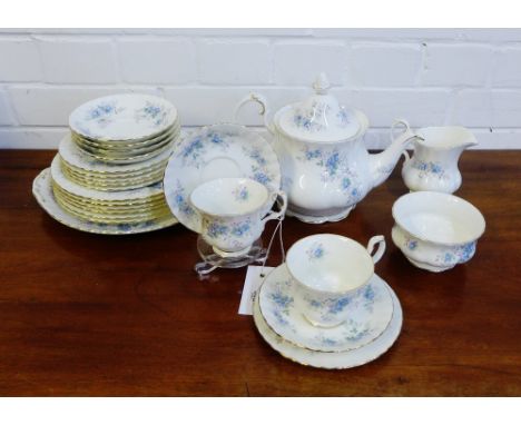 A Royal Albert 'Blue Blossom' patterned china tea set comprising six cups, six saucers, six side plates, six larger plates, a