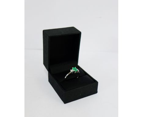 14 carat white gold Colombian emerald and white sapphire dress ring, UK ring size R