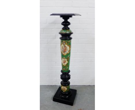 A wooden torchere / plant stand decorated with faux ceramic rococo style cherub panels,  118cm high