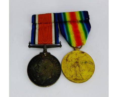 WWI medals awarded to M-324815 Pte J Wood, to include the Victory medal and British War Medal, complete with ribbons (2) 
