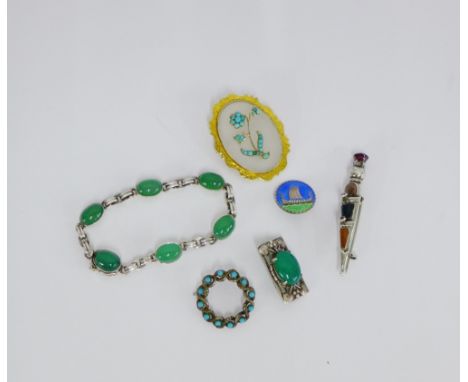 A mixed lot to include a silver and green hardstone bracelet, sterling silver and Scottish hardstone dagger brooch, a Scandin
