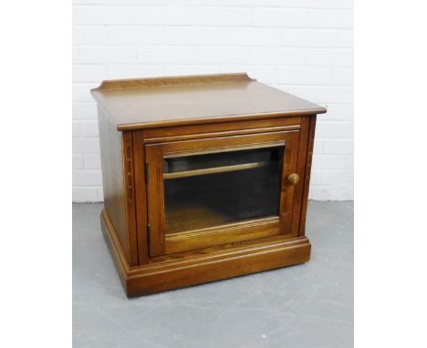 An Ercol 'Mural' range low base TV cabinet in Golden Dawn finish, 56 x 64cm 