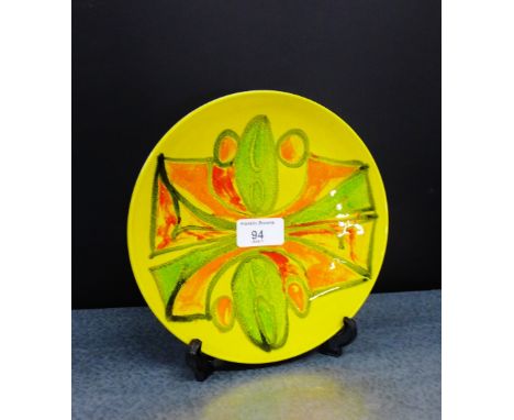 A Poole Delphis plate, 20cm