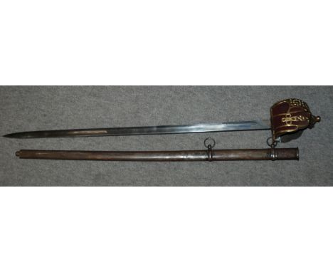 A Scottish basket hilt sword in metal scabbard Condition Report: Available upon request