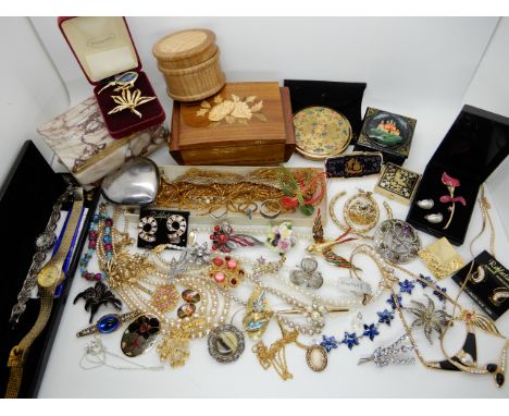 A collection of vintage costume jewellery and a compact to include decorative trinket boxes Condition Report: Not available f