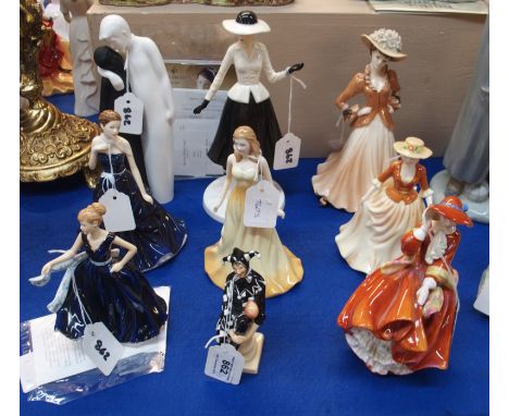 Eight Royal Doulton figures including Top O The Hill, October Opal, Congratulations, Jester HN5649, Brotherly Love, 1940's Ju