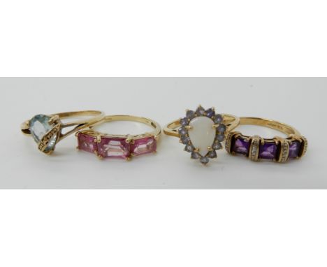 A 9ct flamingo topaz ring size P, a 9ct opal and tanzanite cluster ring size P1/2, a 9ct amethyst and diamond accent ring siz